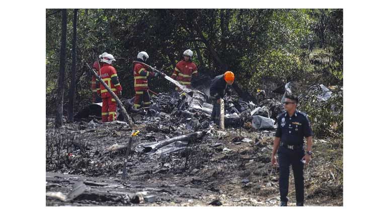 Private jet crashes into motorbike and car in Malaysia; politician among 10 killed